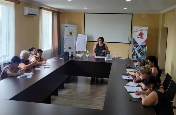 На встрече группы самопомощи в Хони